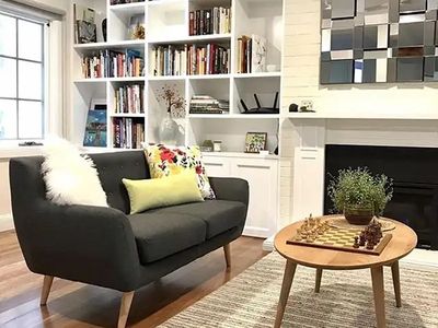 Custom wall unit and built-in shelving with shaker doors